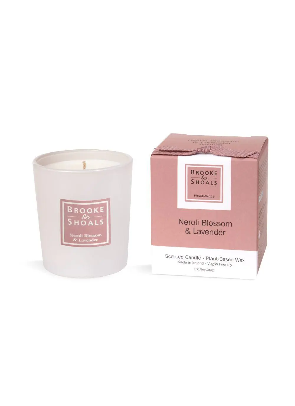 White cutout shot with candle and Packaging